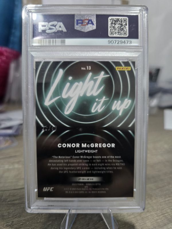2023 Panini Donruss Optic – Conor McGregor Light It Up Blue PSA 9 (/49) 🔥🥊 - Imagen 2